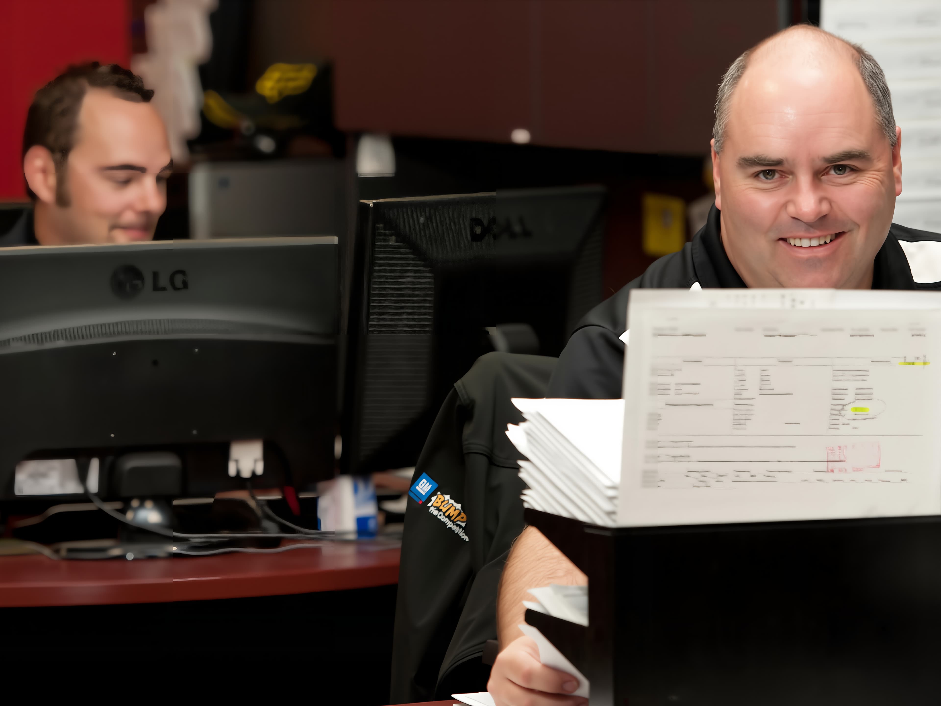 2 men doing computer work