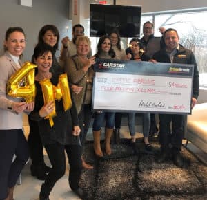 CARSTAR team holding CF check