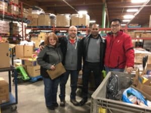 Carstar team donating